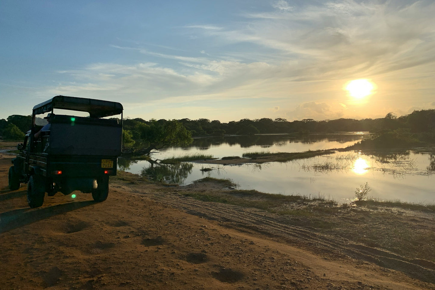 Safari jeep driving through Yala National Park